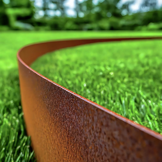 1.6mm corten steel garden edging used to define garden beds and pathways, offering a durable, weather-resistant, and low-maintenance landscaping solution.